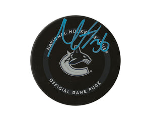 Nils Hoglander Autographed Vancouver Canucks Official Game Puck