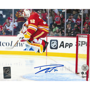 Dustin Wolf Autographed Calgary Flames Pre-Game Jump 8x10 Photo
